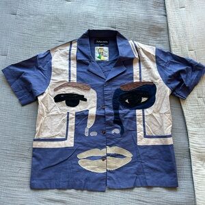 Like new Kid Sister button down shirt. Size M